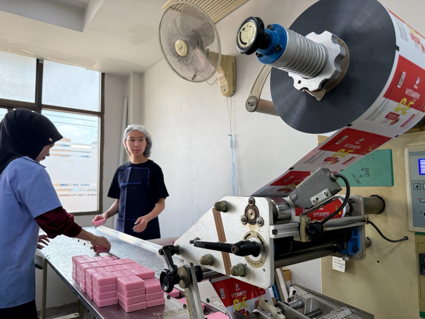 Winnie on the soap packaging line