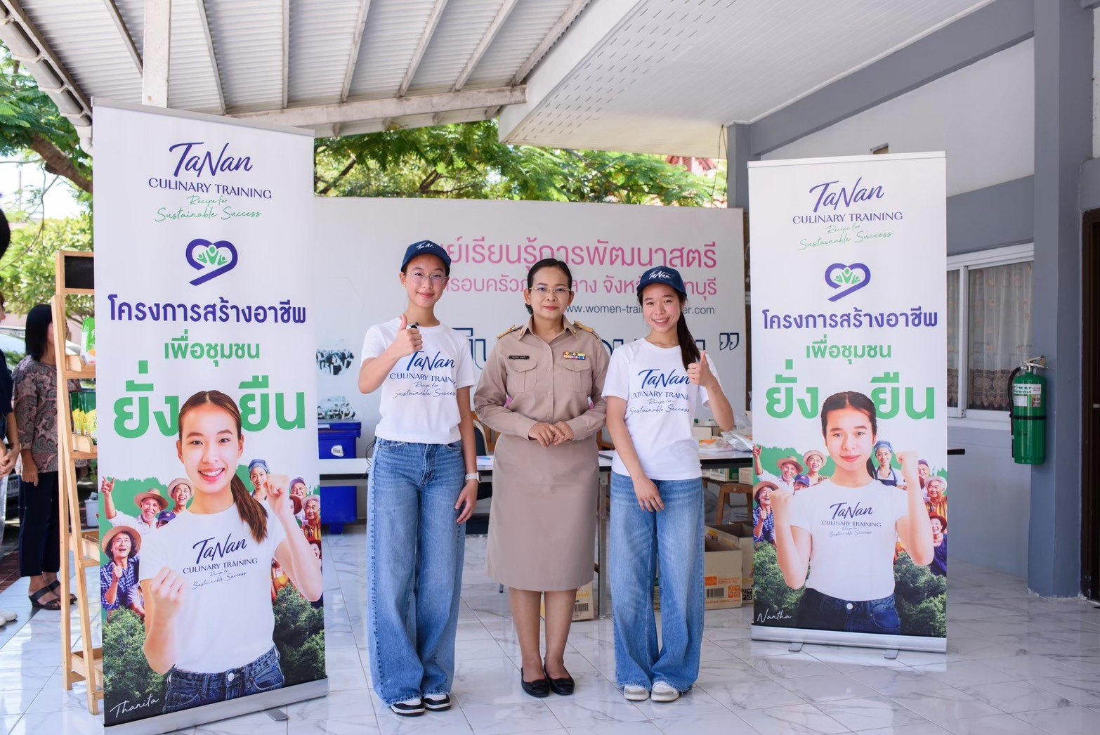 Winnie and Annie with an official at the women’s shelter in Nonthaburi